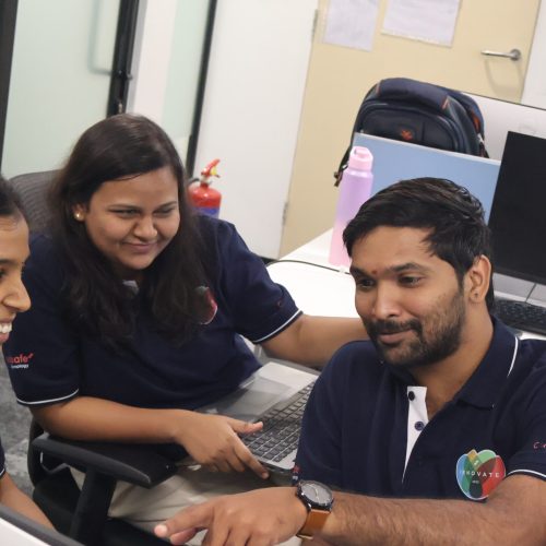 Three colleagues from Creditsafe India having fun and collaborating during our innovation day.