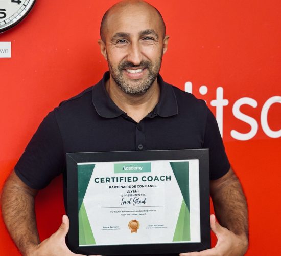 A picture of Said Ghoul with his certificate from learning at the Creditsafe Sales Academy