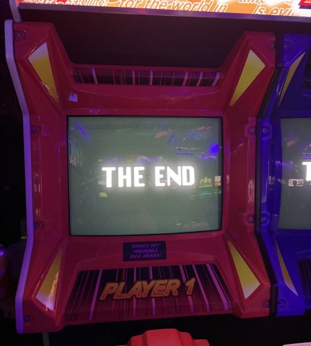 A picture of an 'the end' frame from the arcade game, Time Crisis, which was taken at our NQ64 social.