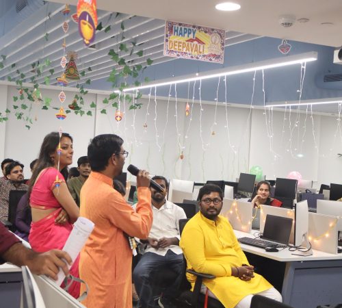 A photo of one of our team members giving a commemoration speech in celebration of Diwali